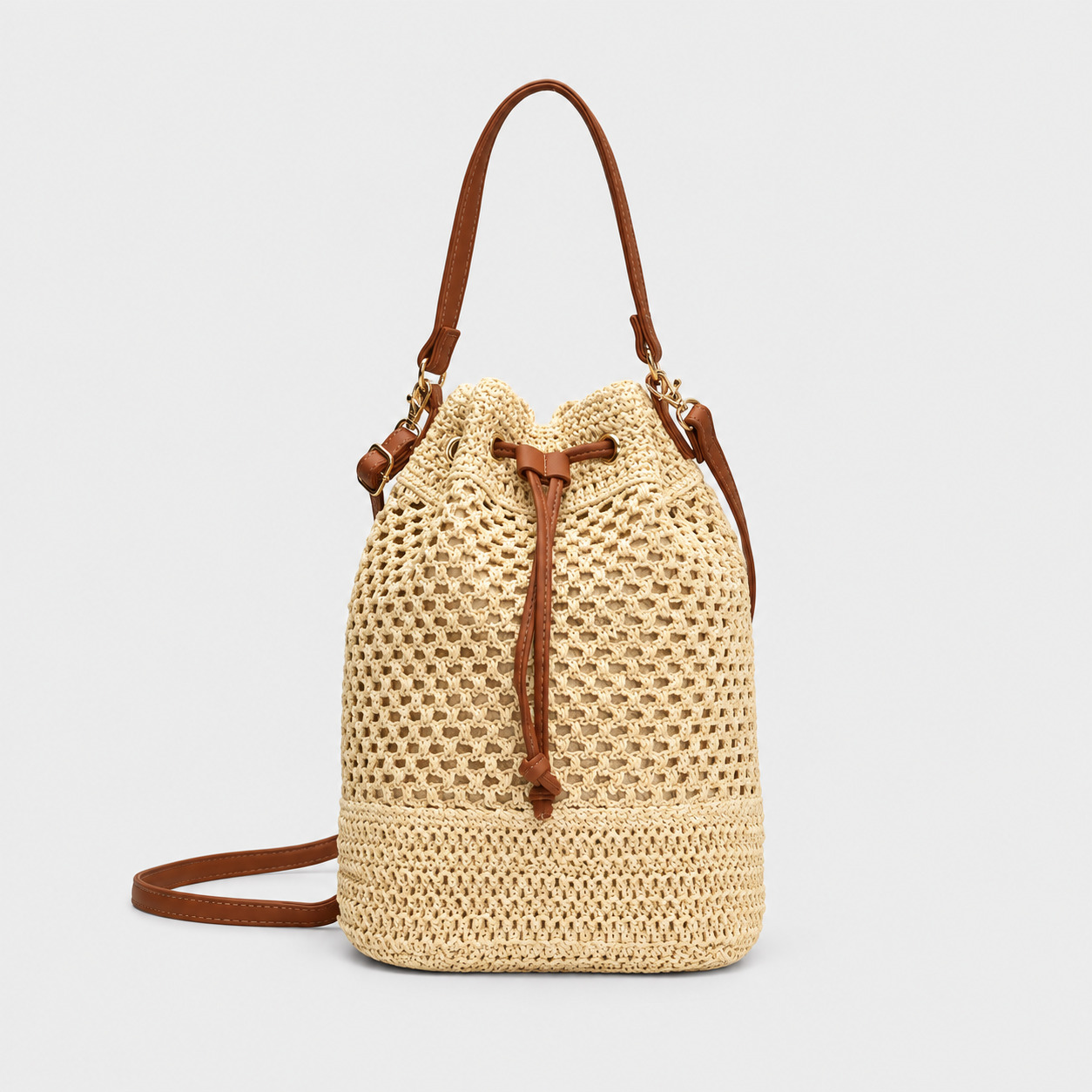 Sac en paille seau ajouré avec cordon coulissant rosemonde couleur naturelle et détails marron