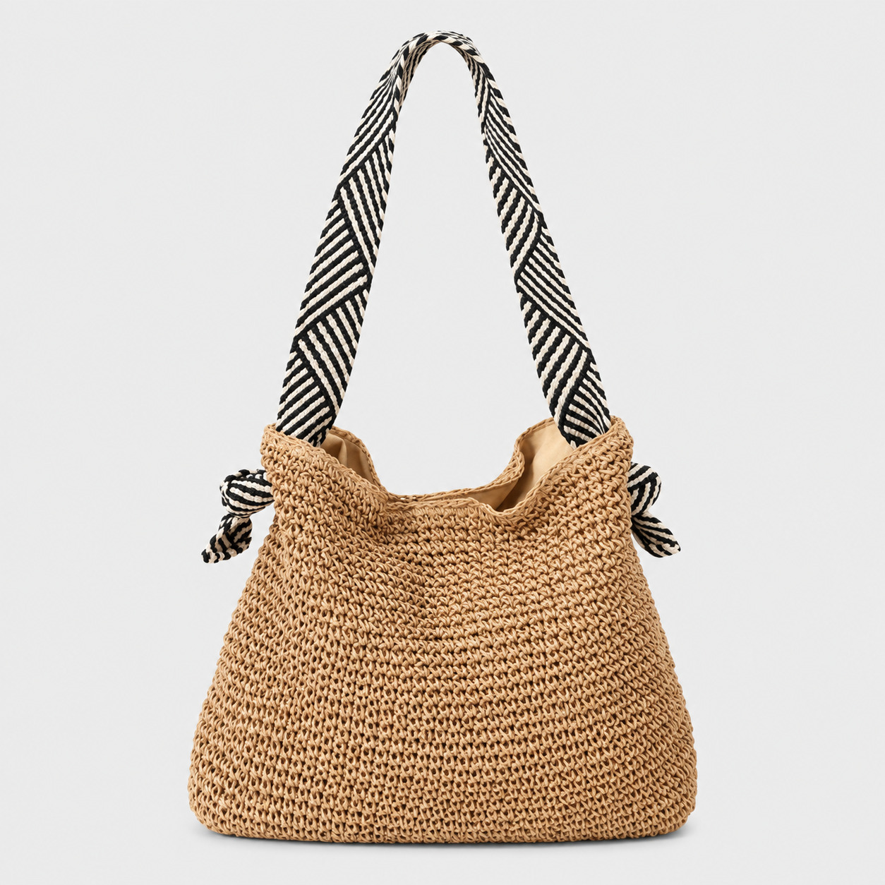 Sac en paille crochet beige avec bandoulière rayée noire et blanche modèle Bertille
