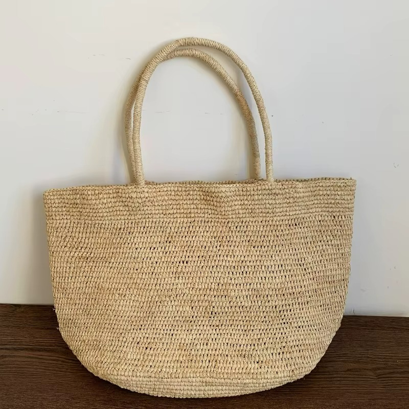Sac En Paille Tressée Grand Fourre-Tout Plage – Valentine Sac en paille tressée grand fourre-tout plage Valentine beige avec anses rondes